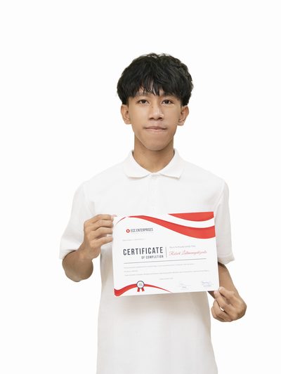 ECC graduate with completion certificate